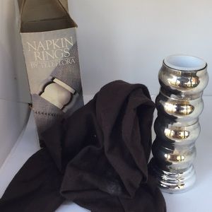 Four Teleflora silver plated napkin rings